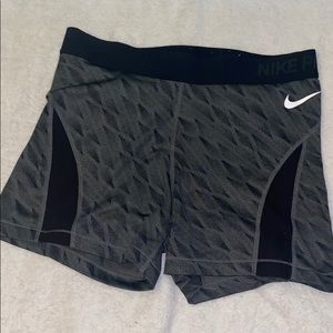 Grey and black nike pros